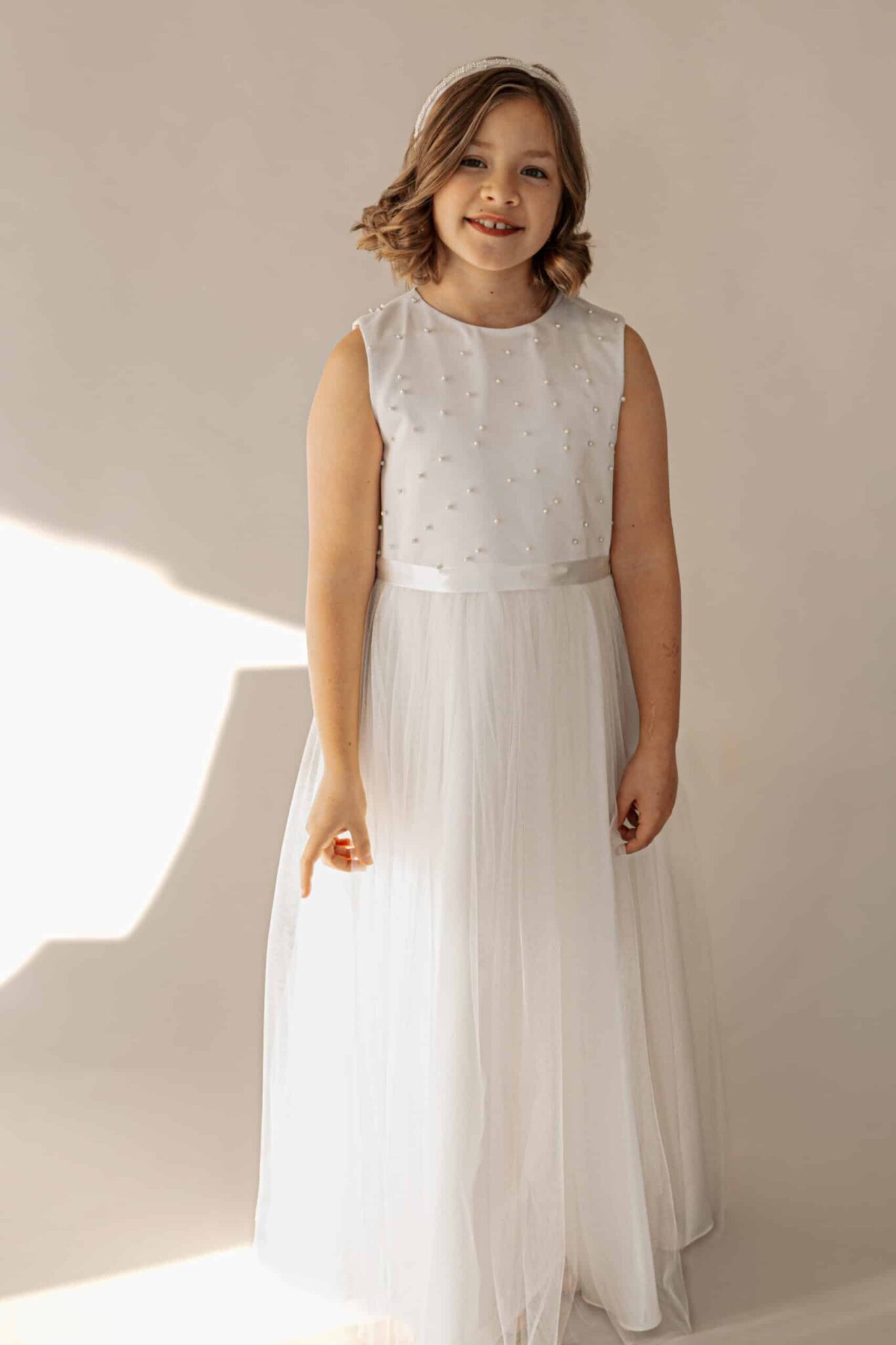 Kommunionkleid in ivory mit Perlenoberteil